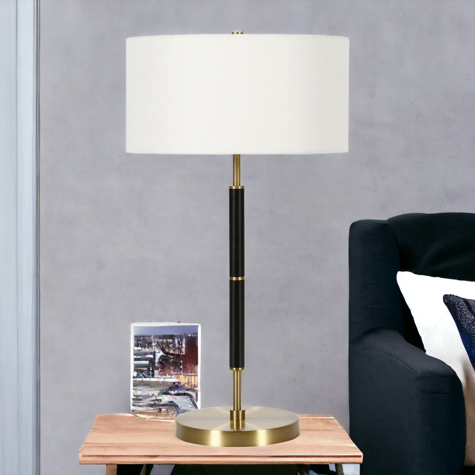 25 Black and Gold Metal Two Light Table Lamp With White Drum Shade